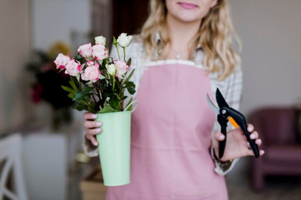 woman-with-roses-pruner_23-2147742956.jpg Flower Care Fundamentals